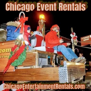 Holiday-themed event with people in festive attire on a decorated float.